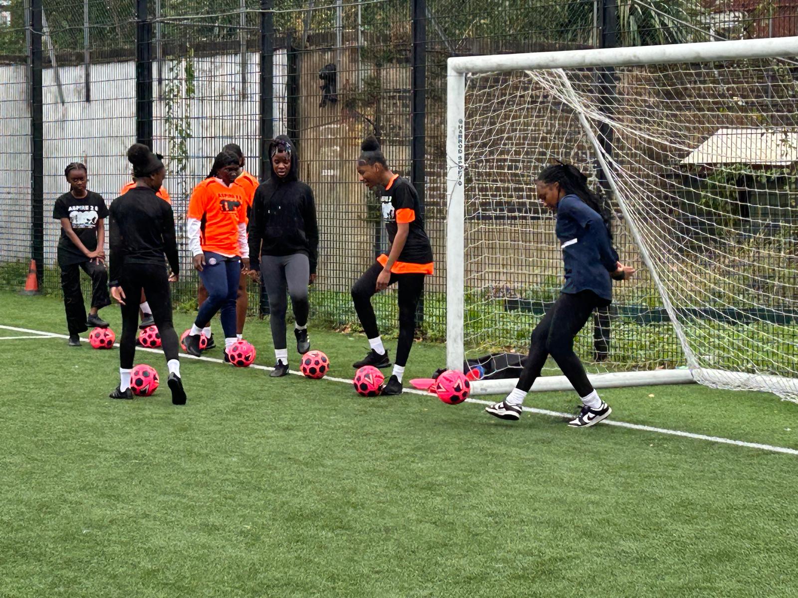 Girls football coaching session at Aspire 2 B