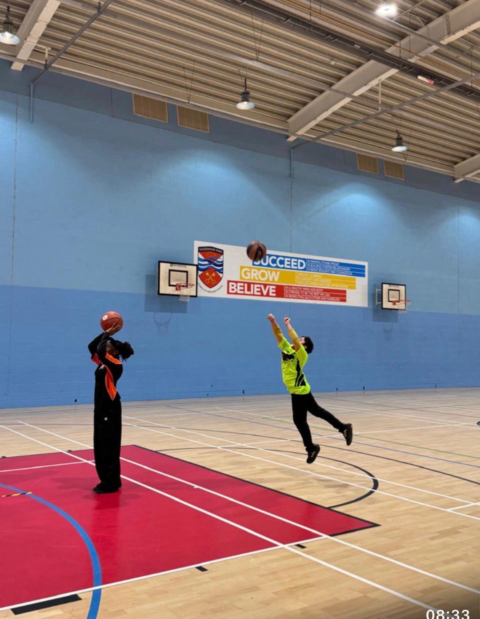 Aspire 2 B basketball coaching session in a sports hall